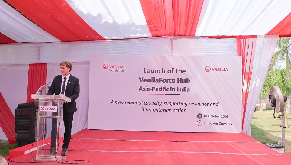 Wide shot of the inauguration stage with David Poinard at the podium in front of the "Launch of the VeoliaForce Hub Asia-Pacific in India" backdrop.